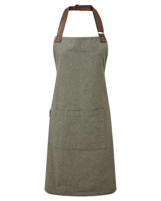 green apron with brown straps on a white background