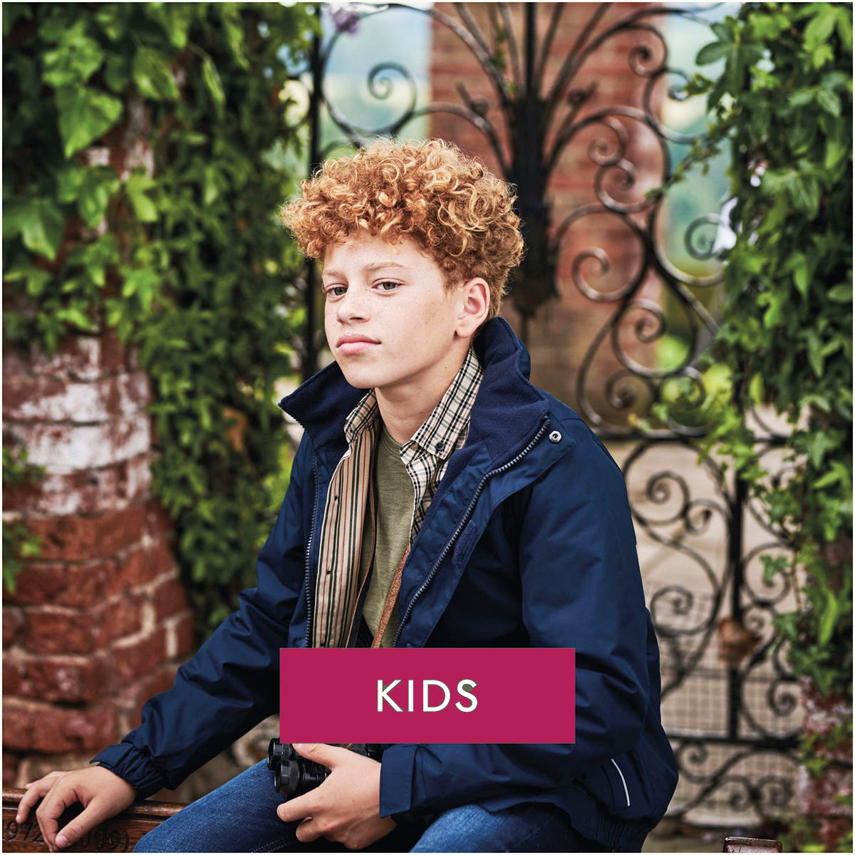 A child wearing hard-wearing kids' workwear and country clothing from Print Press, showcasing expert embroidery and safe, professional branding from our specialist print lab.